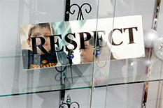 a sign in a glass case bearing the word &quot;Respect&quot;